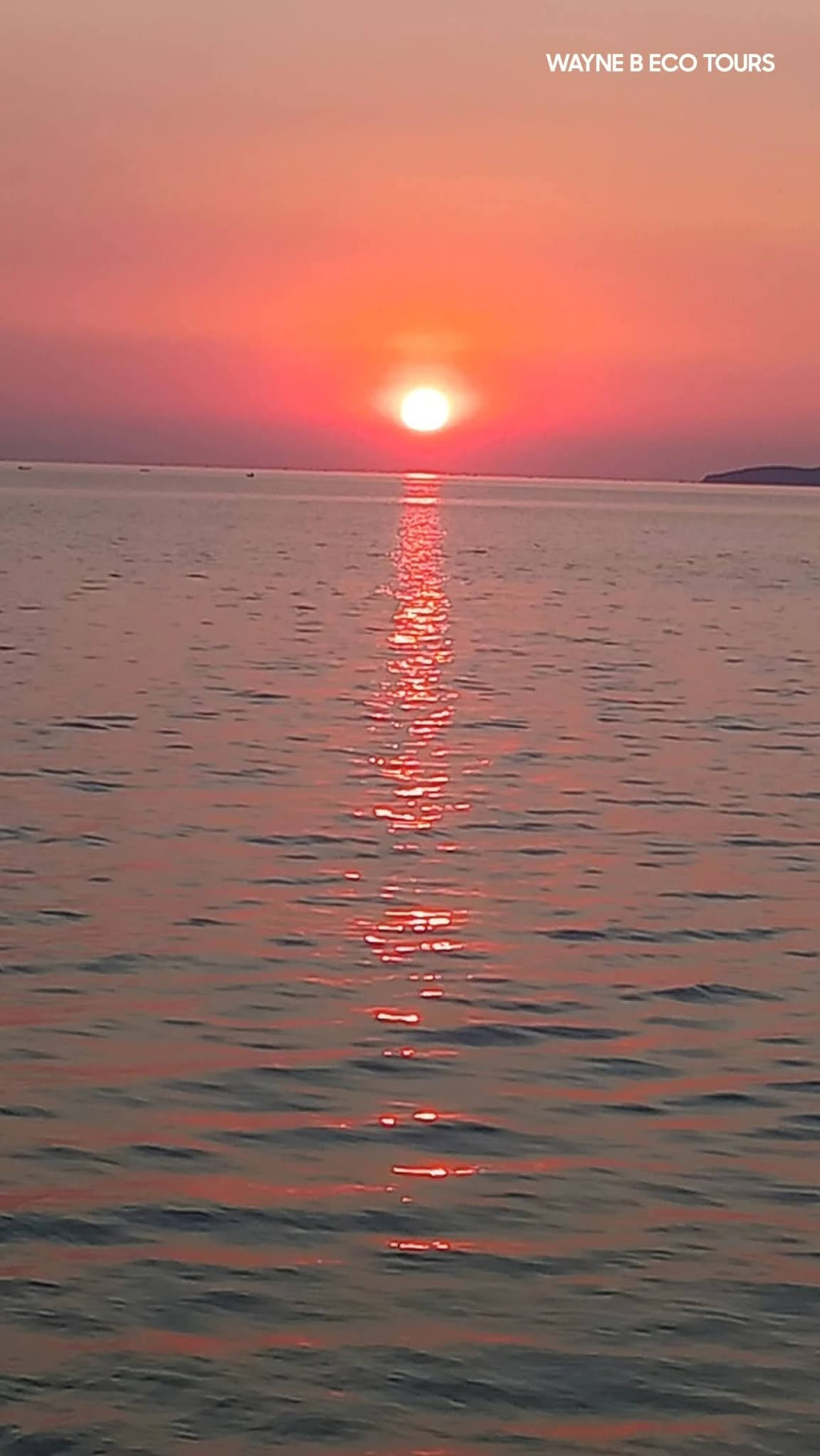 Sunset over Lake Malawi seen from a boat